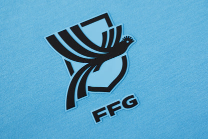 Camisa Polo Celeste GUA 26/27